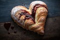 heart-shaped croissant filled with strawberry or blackberry jam