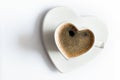 Heart shaped cup of black coffee on white. Love Royalty Free Stock Photo