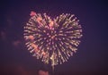 Heart shaped fireworks exploding in the night sky displaying love Royalty Free Stock Photo