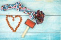 Heart-shaped food and pet supplies on wooden background Royalty Free Stock Photo