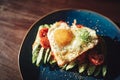 Heart shaped fried egg for a romantic breakfast Royalty Free Stock Photo