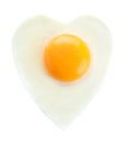 Heart shaped fried egg isolated on white, top view Royalty Free Stock Photo