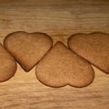Heart shaped gingerbread cookies fresh from the oven, undecorated, preparing for Christmas at home Royalty Free Stock Photo