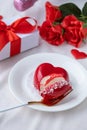 heart shaped glazed valentine cake in bed