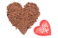 Heart shaped grated chocolate on white background Royalty Free Stock Photo