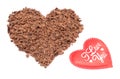 Heart shaped grated chocolate on white background Royalty Free Stock Photo