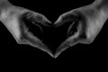 Heart Shaped Hands Close up isolated, Black and white, Concept of love and care Royalty Free Stock Photo