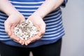 Heart-shaped hands palms full of diet supplements pills Royalty Free Stock Photo