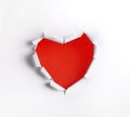 Heart shaped hole in white paper Royalty Free Stock Photo