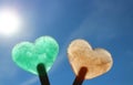 Heart shaped ice in front of the summer sky Royalty Free Stock Photo