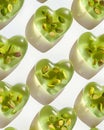A heart-shaped jellies with pistachios. Royalty Free Stock Photo