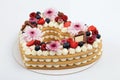 Heart shaped layer cake selective focus Royalty Free Stock Photo