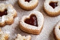 Heart shaped Linzer Christmas cookie filled with strawberry marmalade and dusted with sugar Royalty Free Stock Photo