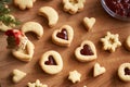 Heart shaped Linzer Christmas cookies filled with strawberry jam Royalty Free Stock Photo