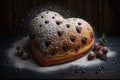 heart-shaped loaf of bread, dotted with ripe berry juices and sprinkled with sugar