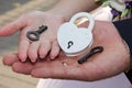 Heart shaped lock and key on the hands of the bride and groom Royalty Free Stock Photo