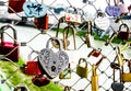 Heart shaped locks on a bridge fence. Deep signs of love. Valentines day concept. Postcard for lovers. Close to heart Royalty Free Stock Photo