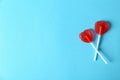 Heart shaped lollipops and space text color background Royalty Free Stock Photo