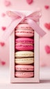 Heart-shaped macaroon gift wrap on a pink romantic background with hearts Royalty Free Stock Photo