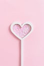 Heart shaped magic wand with star sequins Royalty Free Stock Photo