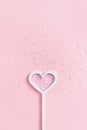 Heart shaped magic wand with star sequins Royalty Free Stock Photo