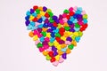 Heart shaped of multicolor painted sewing buttons