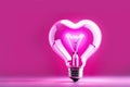 Heart shaped neon light bulb in pink background. Light BulbHeart. Royalty Free Stock Photo
