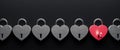 Heart shaped padlocks on black background with copy space. Valentines day love concept 3d render