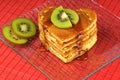 Heart-shaped pancakes with syrup and kiwi fruit Royalty Free Stock Photo