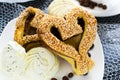 Heart-shaped pastry with sesame seeds Royalty Free Stock Photo
