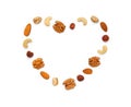 Heart shaped pattern lined with various nuts and seeds with copy space for text Royalty Free Stock Photo