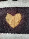 Heart-Shaped Pattern on Textured Dark and Light Fabric Close-Up Royalty Free Stock Photo