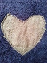 Heart-Shaped Pattern on Textured Dark and Light Fabric Close-Up Royalty Free Stock Photo