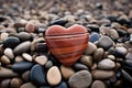 Heart shaped pebble on a beach. Royalty Free Stock Photo