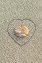 Heart shaped pebble on the beach Royalty Free Stock Photo