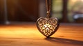 Heart-shaped pendant on a rustic wooden table, vintage golden gift nostalgic lighting Royalty Free Stock Photo