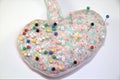 Heart shaped Pin cushion with pins on white Royalty Free Stock Photo