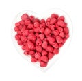 Heart-shaped plate of fresh ripe raspberries, top view Royalty Free Stock Photo