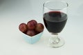 Heart shaped plate, grapes, red wine, wine glass