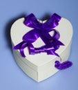 Heart shaped present box with ribbon Royalty Free Stock Photo
