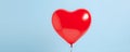 Heart shaped red air balloon flying in blue sky. Symbol of love. St Valentine\'s day concept Royalty Free Stock Photo