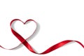 Heart shaped red ribbon for Valentine`s day celebration on an isolated white background Royalty Free Stock Photo