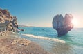 Heart shaped rock on beach on sunny summer day Royalty Free Stock Photo