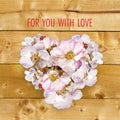 Heart shaped rosehip flowers card Royalty Free Stock Photo