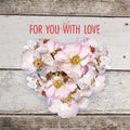 Heart shaped rosehip flowers card Royalty Free Stock Photo