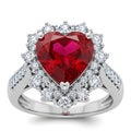 Heart-shaped ruby ring with diamonds isolated on white background Royalty Free Stock Photo