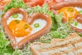 Heart shaped sausages with fried eggs Royalty Free Stock Photo