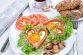 Heart shaped sausages with fried eggs Royalty Free Stock Photo