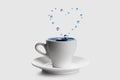 Heart shaped splash in white coffee cup Royalty Free Stock Photo