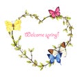 Heart shaped spring wreath from twigs, young foliage and butterflies